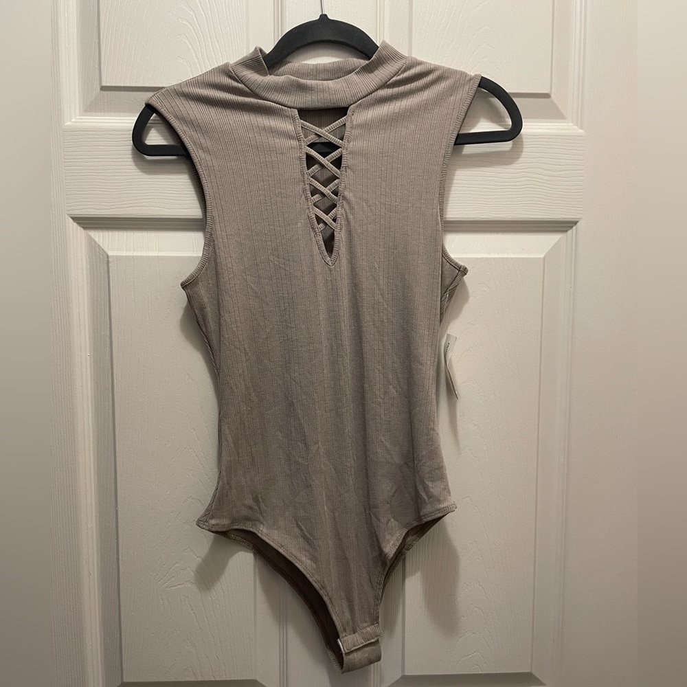 Tan body suit